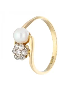 Anillo con perla y brillantes oro amarillo 18kl