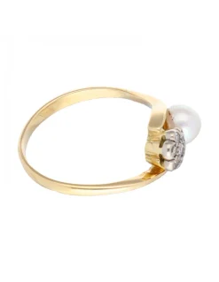 Anillo con perla y brillantes oro amarillo 18kl