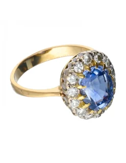 Anillo de oro 18 kl con diamantes y zafiro