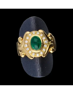 Anillo de oro 18 kl con esmeralda y diamantes