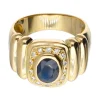 Anillo de oro 18 kl con zafiro y zirconita
