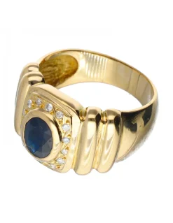 Anillo de oro 18 kl con zafiro y zirconita