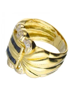 Anillo de oro 18 kl con zafiro y zirconita