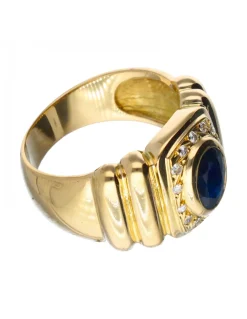 Anillo de oro 18 kl con zafiro y zirconita