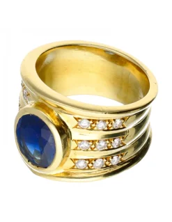 Anillo de oro 18 kl con zafiro y diamantes