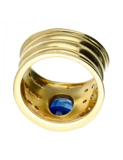 Anillo de oro 18 kl con zafiro y diamantes