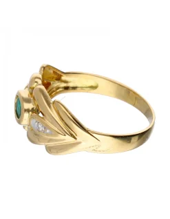 Anillo de oro 18 kl con zirconitas y esmeraldas