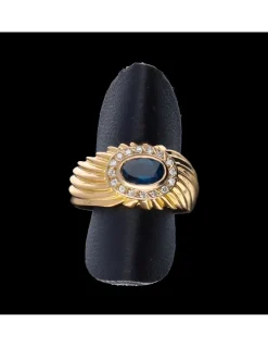 Anillo de oro 18 kl con zirconitas y zafiro