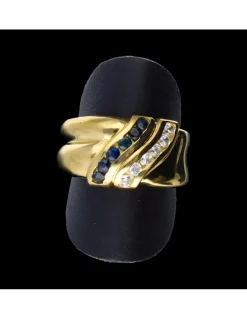 Anillo de oro 18 kl zafiro y zirconita