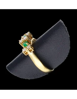 Anillo de oro 18 kl zirconitas y esmeraldas