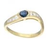 Anillo de oro amarillo 18 K con diseño brillantes y zafiro