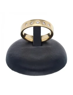 Anillo de oro amarillo 18 K con diseño y circonitas