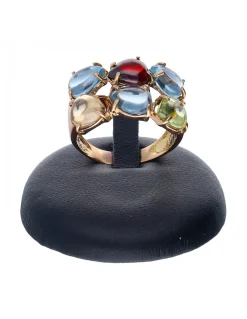 Anillo de oro amarillo 18 K con diseño y piedras sintéticas