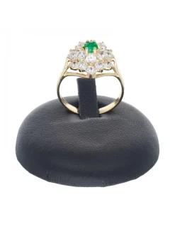 Anillo de oro amarillo 18 Kl con diseño circonitas y piedra sintética