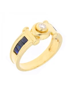 Anillo de Oro amarillo 18 K con diseño y circonitas circundantes