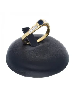 Anillo de oro amarillo 18 K con diseño brillantes y zafiro