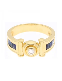 Anillo de Oro amarillo 18 K con diseño y circonitas circundantes