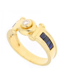 Anillo de Oro amarillo 18 K con diseño y circonitas circundantes