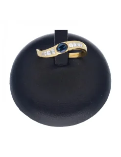 Anillo de oro amarillo 18 K con diseño brillantes y zafiro