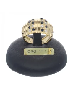 Anillo de oro amarillo con diseño y circonitas