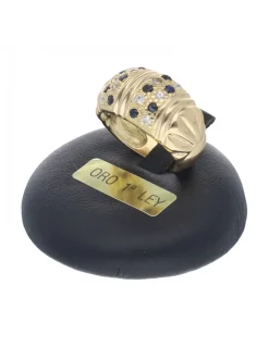 Anillo de oro amarillo con diseño y circonitas