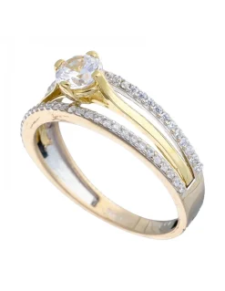 Anillo de oro amarillo con diseño y circonitas