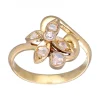 Anillo de Oro amarillo 18K con diseño de Flor y Brillantes