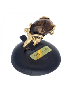 Anillo de oro amarillo 18K con diseño y piedra sintética