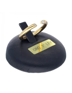 Anillo de oro amarillo 18K con diseño y circonitas