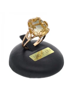 Anillo de oro amarillo 18K con diseño y circón