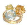 Anillo de oro amarillo 18K con diseño y Piedras Sintéticas