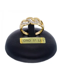 Anillo de oro amarillo 18K con diseño y circonitas