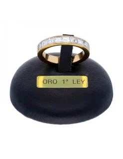 Anillo de oro amarillo 18K con diseño y brillantes