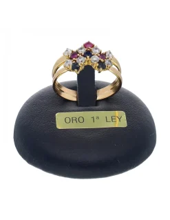 Anillo de oro amarillo 18K con diseño y circonitas