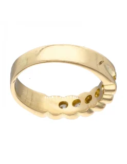Anillo de oro amarillo 18K con diseño y brillantes