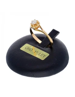 Anillo de oro amarillo 18K con diseño y brillante