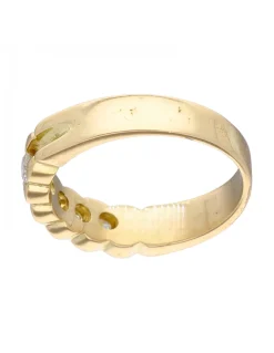 Anillo de oro amarillo 18K con diseño y brillantes
