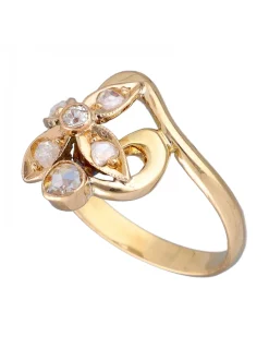 Anillo de Oro amarillo 18K con diseño de Flor y Brillantes