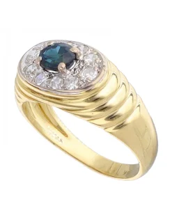 Anillo de Oro amarillo 18K con diseño, Brillantes y un Zafiro Sintético