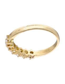 Anillo de oro amarillo 18K con diseño y brillantes