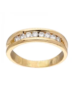 Anillo de oro amarillo 18K con diseño y brillantes