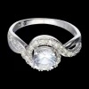 Anillo de oro blanco 18 kl con zirconita central y diamantes
