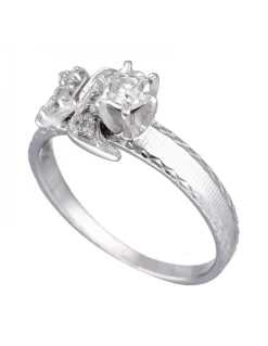 Anillo de Oro blanco 18K con diseño y Brillante
