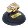 Anillo de oro blanco y amarillo 18K con diseño