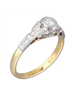 Anillo de Oro blanco y amarillo 18K con diseño y Brillantes