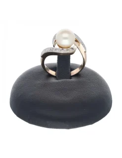 Anillo de oro rosado 18 Kl con diseño brillantes y perla