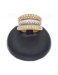 Anillo de tres oros 18 K con diseño y circonitas