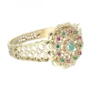 Brazalete de oro amarillo 18 Kl con diseño con piedras sintéticas