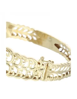 Brazalete de oro amarillo 18 Kl con diseño con piedras sintéticas