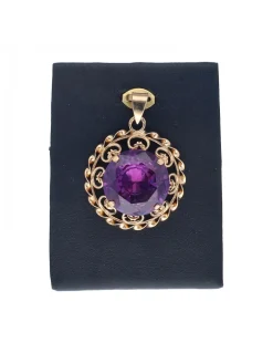 Colgante de oro amarillo 18K con diseño redondo y piedra sintética